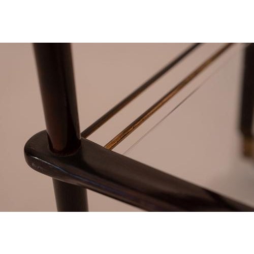 This delicate tea trolley was designed by Cassina around 1955 with a reduced but sophisticated shape. The interesting...