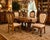 Elevate your dining room with this elegant set of four Louis XV style dining chairs featuring beautifully hand-carved...