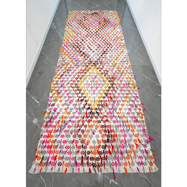 Woven in the Konya region of Central Anatolia during the 1960s, this remarkable flatweave kilim runner represents an...