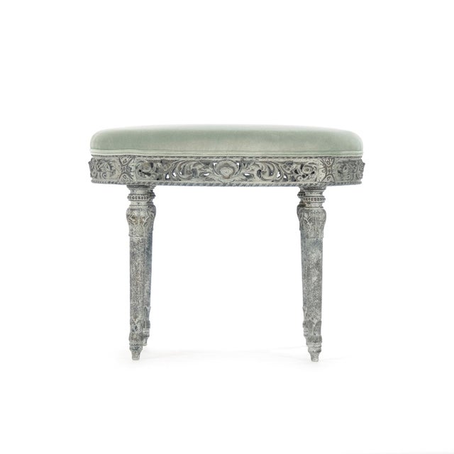 The Galdy Stool from Zentique is a French country round stool with an olive green velvet padded seat on a distressed olive...