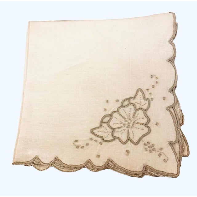 This is a set of 4 unused Madeira, Portugal embroidered cocktail napkins, some with labels still attached. A single flower...