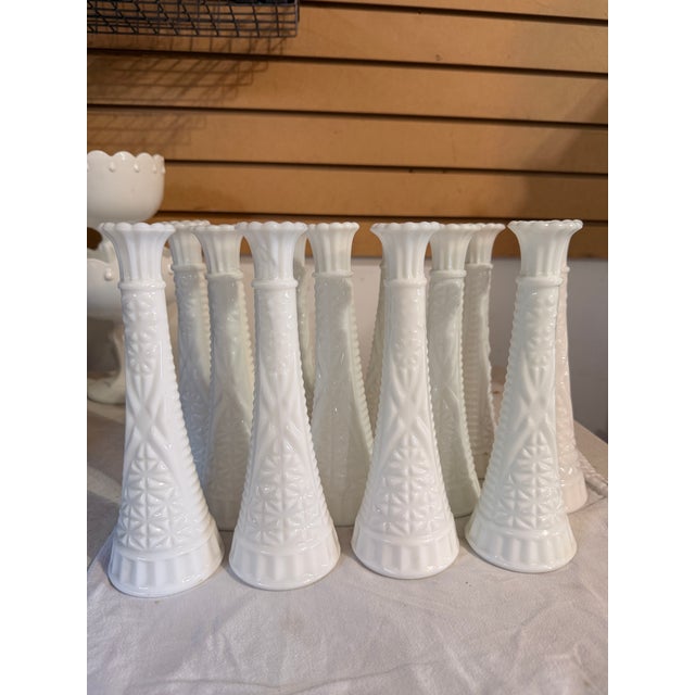Vintage Anchor Hocking Starburst Milk Glass Vases 11 pieces 9" tall. 3" base. Tapers to 1.75" at the top.