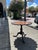 Impressive 19th Century English tilt top table handcrafted in mahogany with a scalloped edge and carved medallions on a...