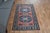 Vintage Hand-Knotted runner rug is a semi-antique vintage area rug. The '70s Eastern region of Anatolia's unique rug is...