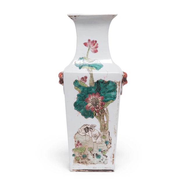 Defined by angular shoulders and a flared lip, this pair of tall porcelain vases offer a charming variation of the classic...