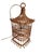Offered is a 1960s wicker pendant light in the shape of a lantern/pagoda temple/bird cage. It features a ring at the top...