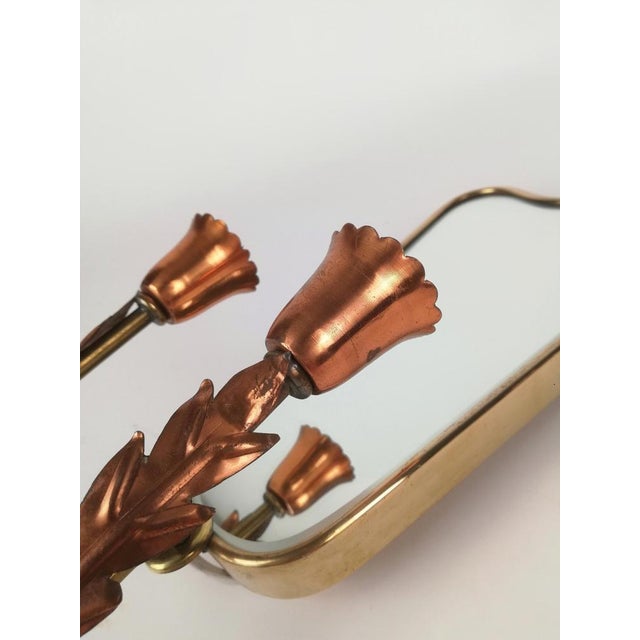 A Pair of glamorous italian wall light datable between the 1940s and the 1950s. These midcentury Sconces were made with...