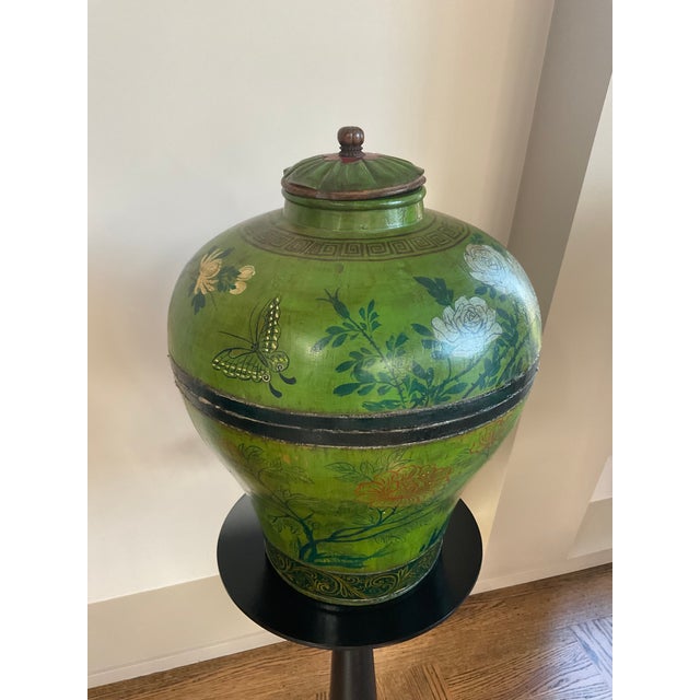 Unique hand painted wooden ginger jar with flower and butterfly motif. Ginger jars are easy to style in almost any decor....