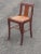 Mid 20th century Duncan Phyfe or English Regency style accent chair. Features rush seat