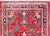 A traditional early 20th century Persian Sarouk runner with an all-over mirrored float pattern woven in varying shades of...