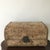 A late 19th century small storage chest constructed of wood and wrapped in a vellum-like material, with an exceptionally...