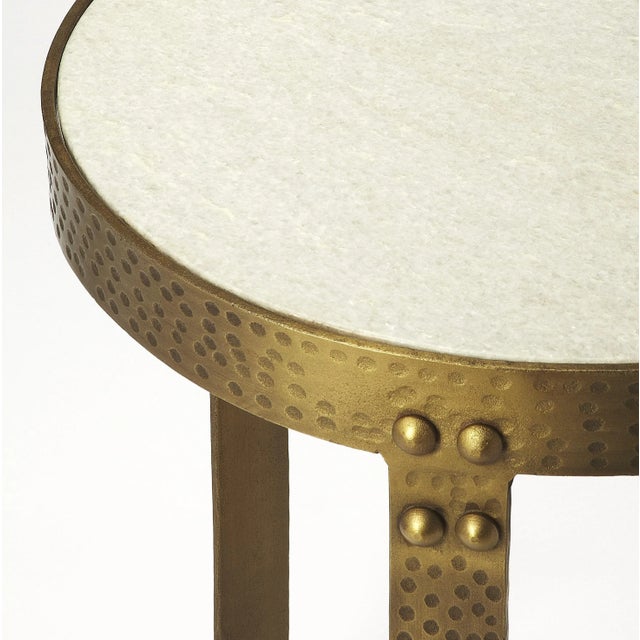Flaunting a high class look; this round end table showcases a white marble top with a beautifully coordinating gold...