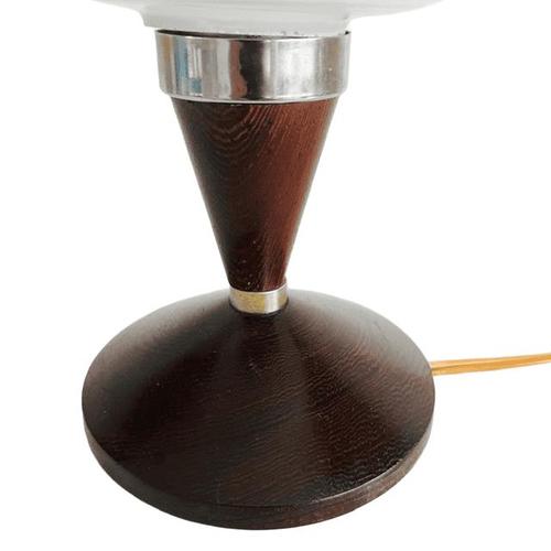 Vintage Mid-Century Danish Design Table Lamp with opaline shade and teak base from the 1960s. Bring the warm, atmospheric...