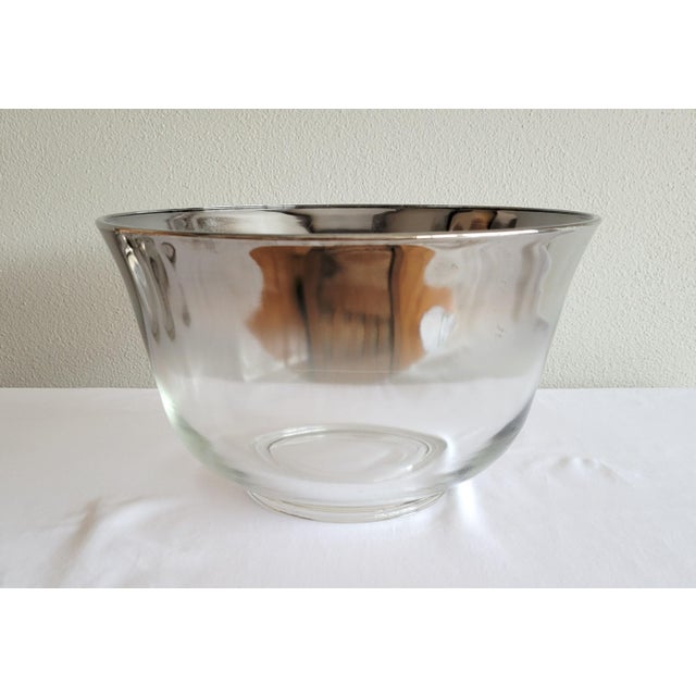 This Mid-Century Modern Dorothy Thorpe Style Roly Poly Punch Bowl & Glasses set features a round shape and a smoked...
