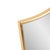 Shaped like a heraldic shield and crowned with ornate gold leaf scrollwork, this mirror evokes the grandeur of a European...