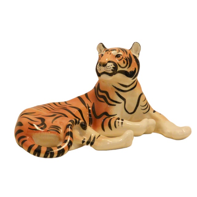 Commanding and lifelike, this large-scale porcelain tiger is a masterpiece of Russian animalier sculpture. Modeled by the...