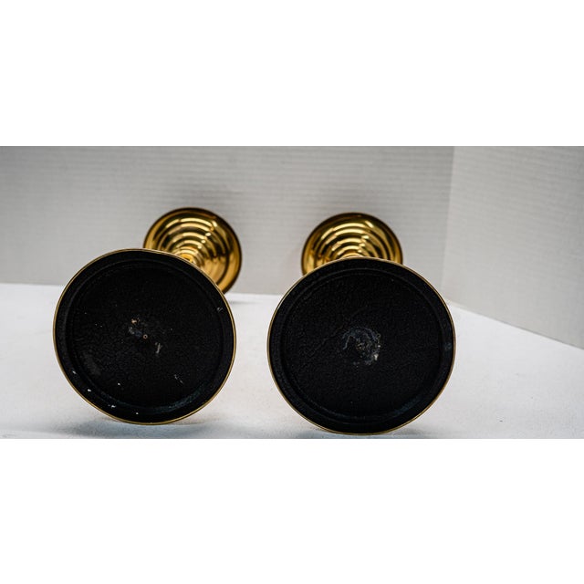 Beautiful set boasting clean lines and elegant style. Tall and very sturdy heavy brass candle sticks perfect for your...