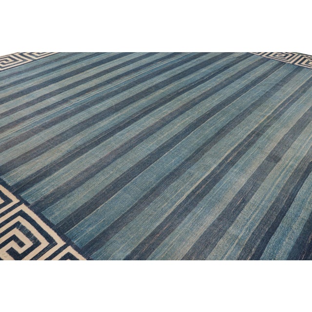 This vintage 14x14 Dhurrie flat weave is an exciting new entry in Rug & Kilim’s esteemed collection. Handwoven in wool, it...