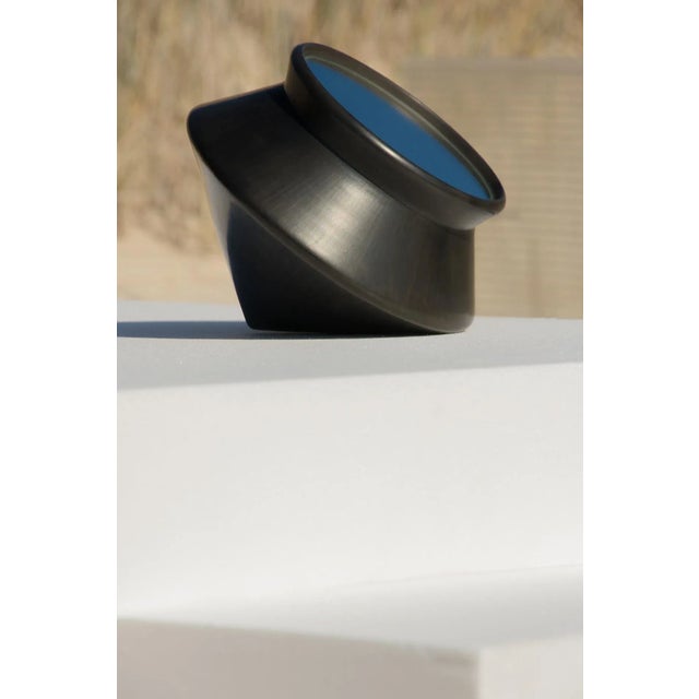 Fragments of a distant time, shaped by the hands and fire. Nero is an experiential interpretation of the ceramic technique...