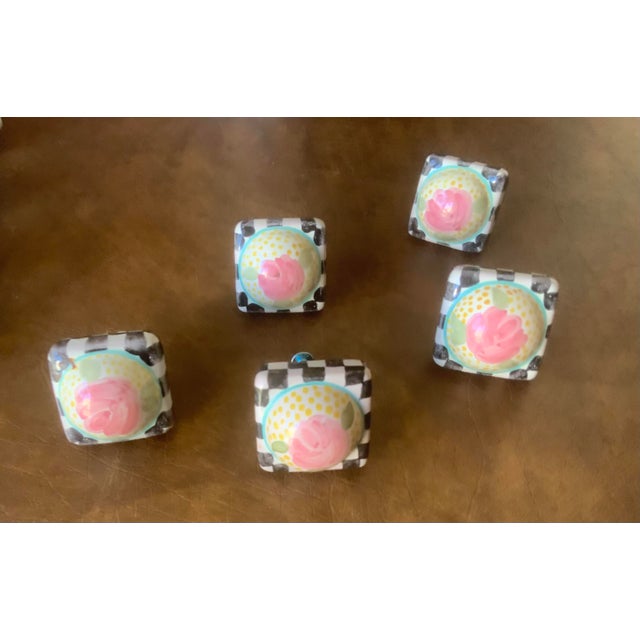 Classic hand painted ceramic black & white check border framing a pink cabbage Rose.