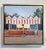 RJ's Place captures a nostalgic roadside diner with its iconic striped awning and vintage signage. The warm, inviting...