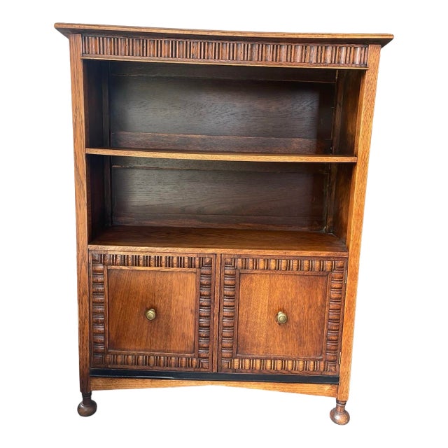 Vintage English Jacobean Revival Oak Bookcase With Reeded Cabinet Doors For Sale