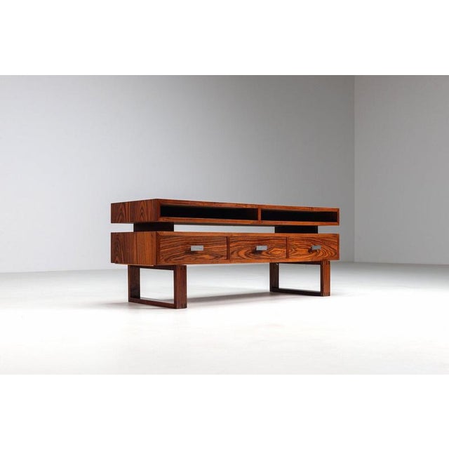 Mid-century modern floating media console in rosewood, Denmark, 1960. A beautifully balanced Scandinavian design with...