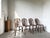 Maison Lecan presents a superb set of four early 20th-century Windsor chairs, characteristic of the English tradition with...