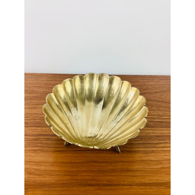 Vintage 1960s Brass Trinket Tray / Bowl made of brass scalloped sea shell design footed base measures appx - 7.5"W - 3"T...