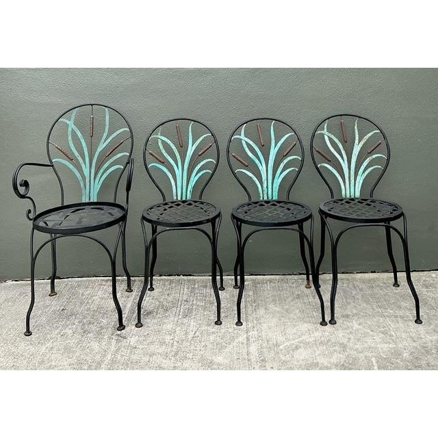 Infuse your outdoor oasis with the whimsical charm of this five-piece vintage dining set. Crafted from durable, rust-...