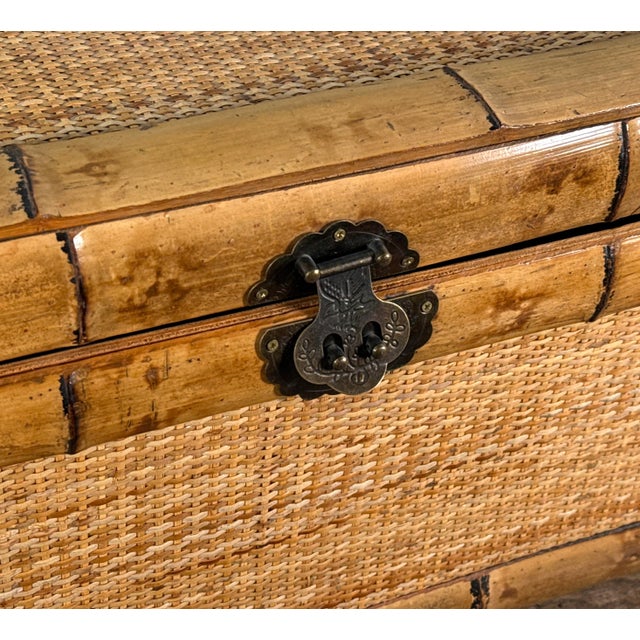 This vintage storage trunk is crafted from bamboo framing with woven rattan panels and fitted with decorative metal...