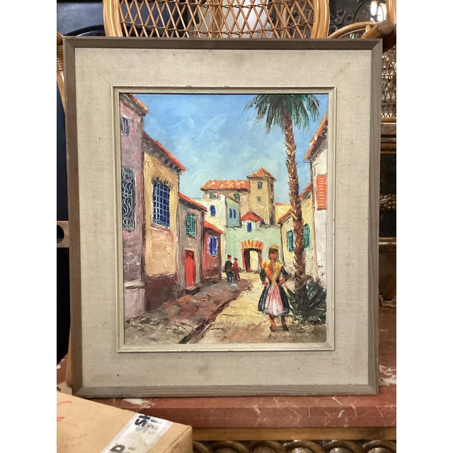 A lovely tropical city scape with a woman standing in the right foreground. In the front left there is a possible title;...
