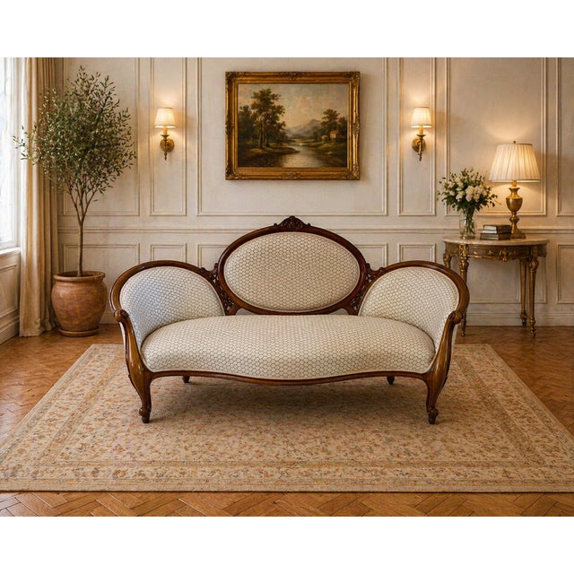 A superb antique Victorian carved walnut salon suite of elegant form and excellent quality dating to the mid 19th century....