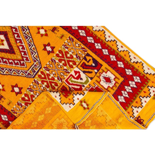Beautiful vintage Moroccan Tribal rug, hand-knotted wool with an orange field, red and ivory accents in an all-over...