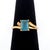 Vintage 10K Yellow Gold Emerald-Cut Blue Topaz Ring, marked "10K. DV. Co". Central topaz approx: 7 x 5 mm. Ring: 0.875" L...