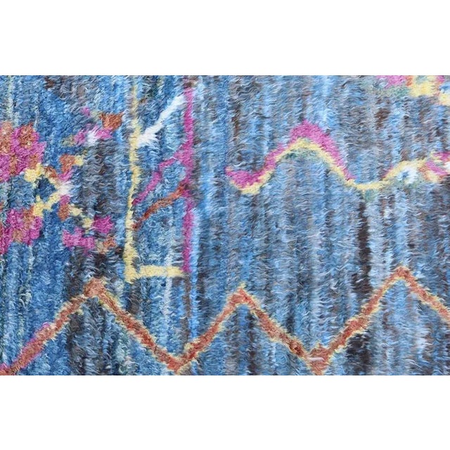 This is a contemporary Moroccan design rug, hand-knotted by skilled weavers using 100% wool. This gorgeous rug is the...