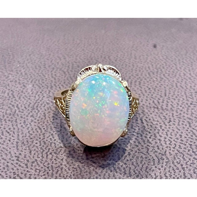 9 Carat Oval Shape Ethiopian Opal Cocktail Ring 14 Karat Yellow Gold For Sale - Image 14 of 18