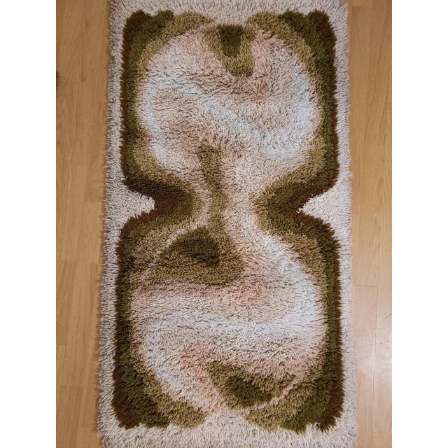 Rug from Desso, the Netherlands, 1970s, in Flawless conditions. Designed 1970 to 1979 This piece is attributed to the...