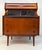 Elegant mid-century modern secretary desk designed by Gunnar Falsig for Falsig Møbler, featuring warm teak construction...