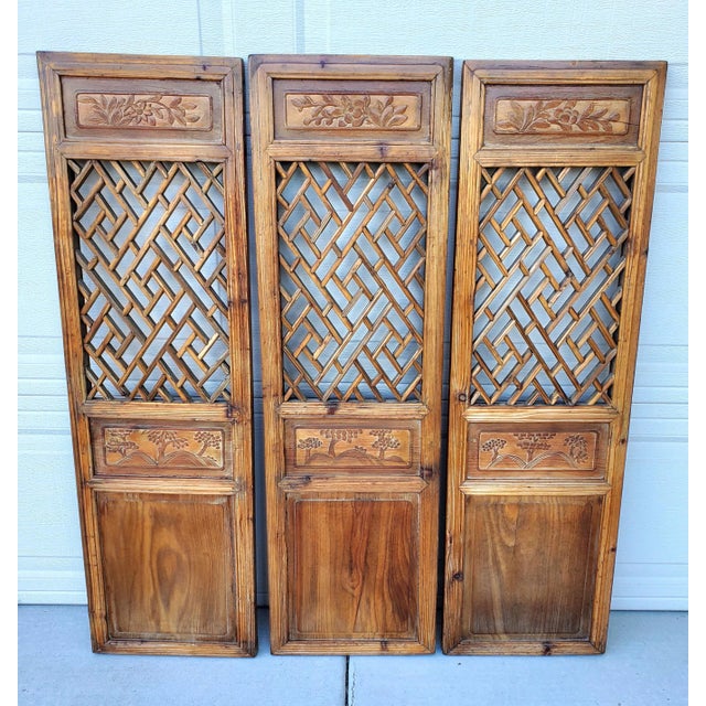 Late 19th Century Chinese Carved Handcrafted Antique Wood Panels Set of Three. This set of three antique Chinese screen...