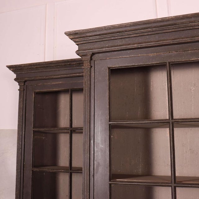 Good pair of 19th Century English painted pine glazed dresser/ cabinets with reeded detail to the doors and uprights. One...