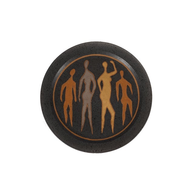 Clyde Burt ceramic charger in glazed stoneware with incised image. Signature to underside: [CB]. American, circa 1965.