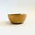 A vintage pottery ashtray by pottery craft finished in earthy colored glazes. Measurse 3.25"Dia x 1.5"H