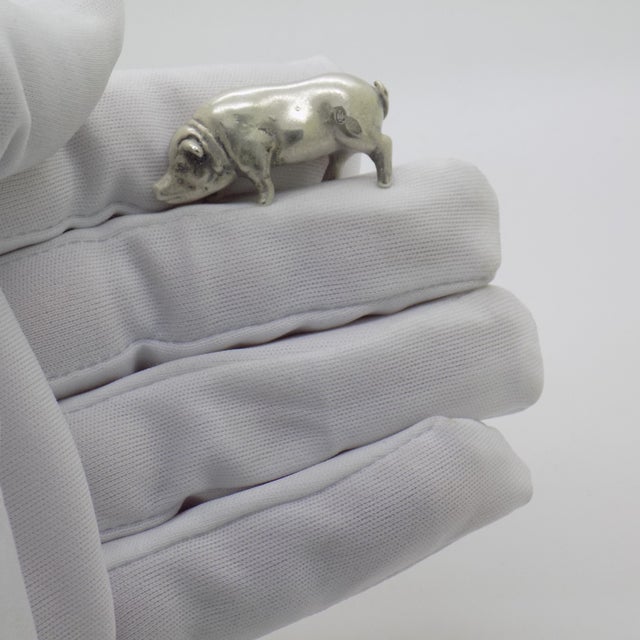This vintage silver decorative object depicts a detailed pig figurine miniature, crafted as a dollhouse centerpiece,...