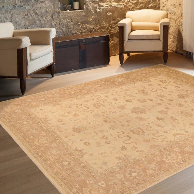 "Enhance the ambiance of your home with this magnificent Persian-influenced Turkish hand-knotted rug made by skilled...