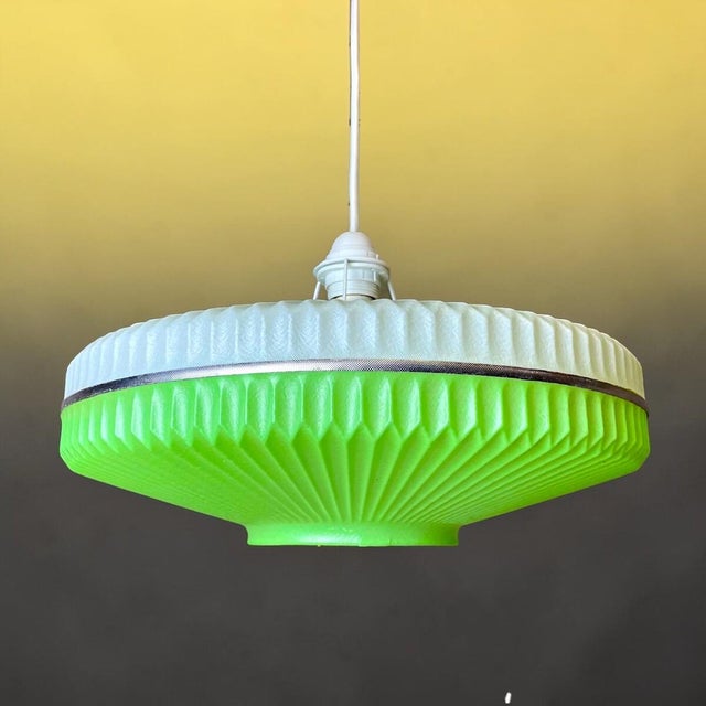This lamp has been designed and made in Soviet Union (Ukraine) in the 1970s. It is made of a plastic material and can be...