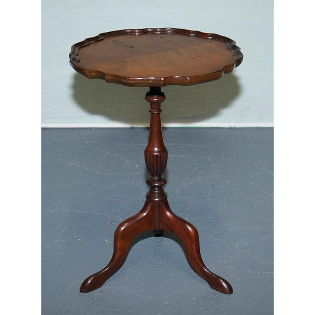 Antiques of London Elegant mahogany tripod side table from the 1930s, featuring a beautifully scalloped edge top with a...