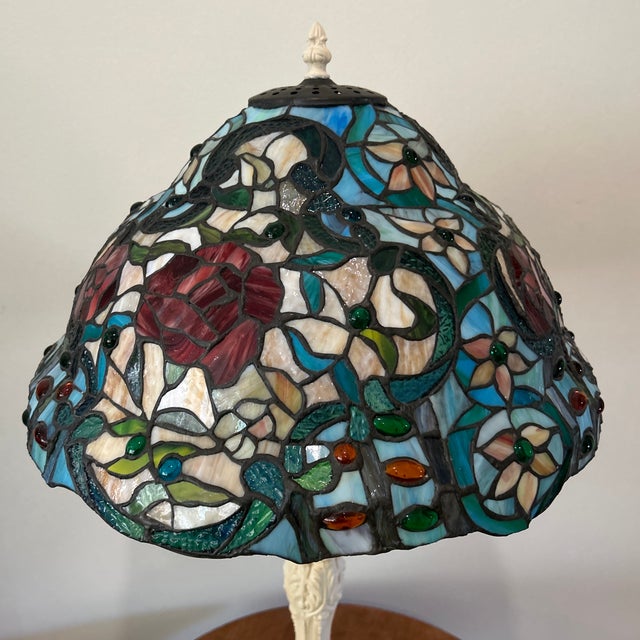 This Vintage Art Nouveau Handcrafted Tiffany Style Rose Stained Glass Table Lamp is a stunning piece that exudes a sense...