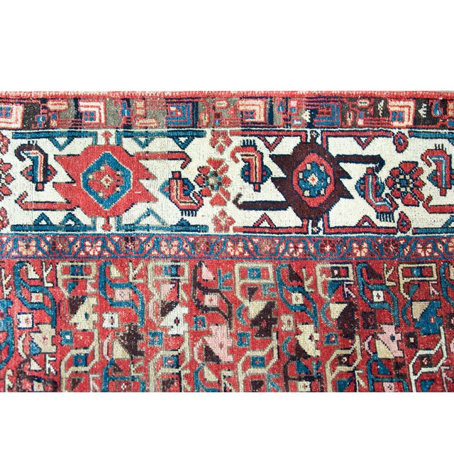 An incredible late 19th century Persian Azari runner with the most wonderful tribal pattern with a central field of all-...