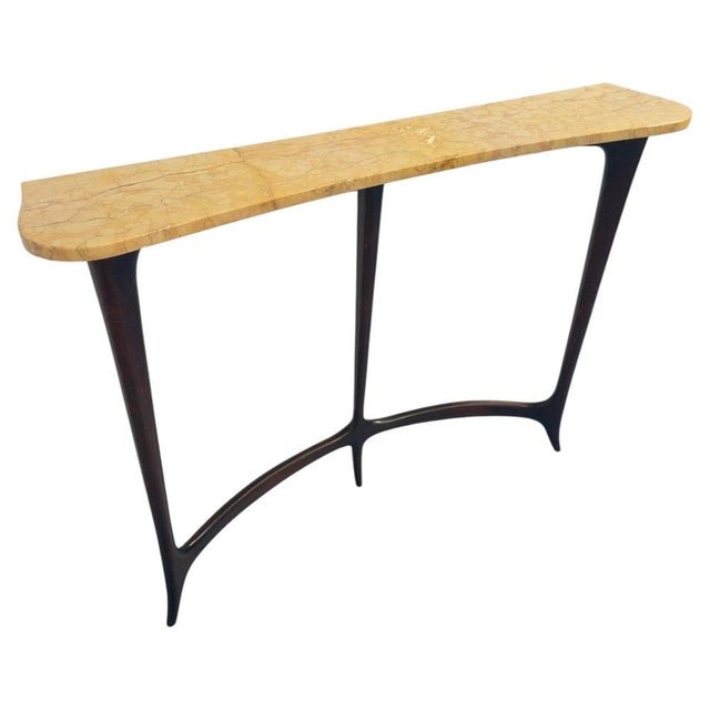 This elegant console table with a royal yellow Verona marble top, designed by the renowned Ezio Minotti, enhances your...